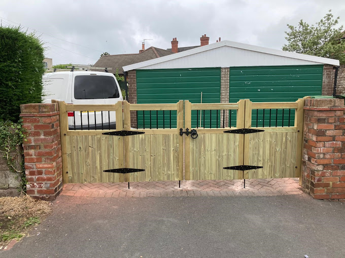 Bordeaux wooden bi folding driveway gate design