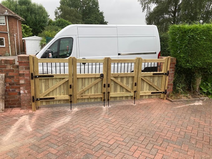 Made to measure Bordeaux wooden gates in a bi fold design