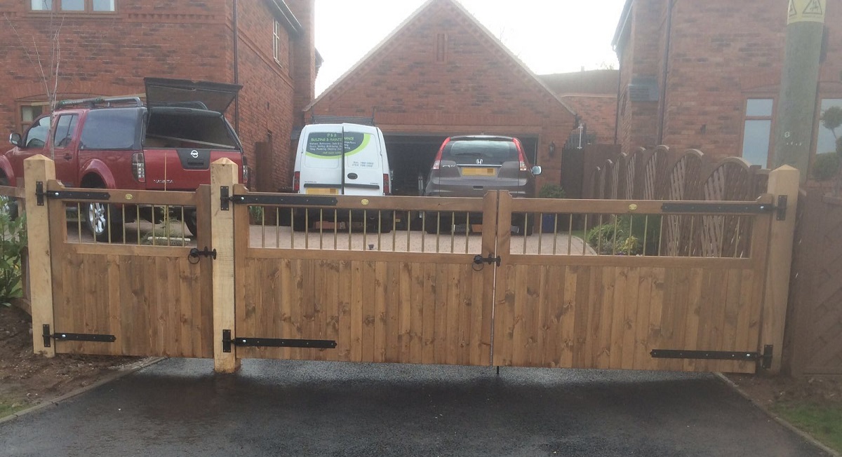 Bordeaux double wooden gates fitted to residential driveway entrance in Blackburn