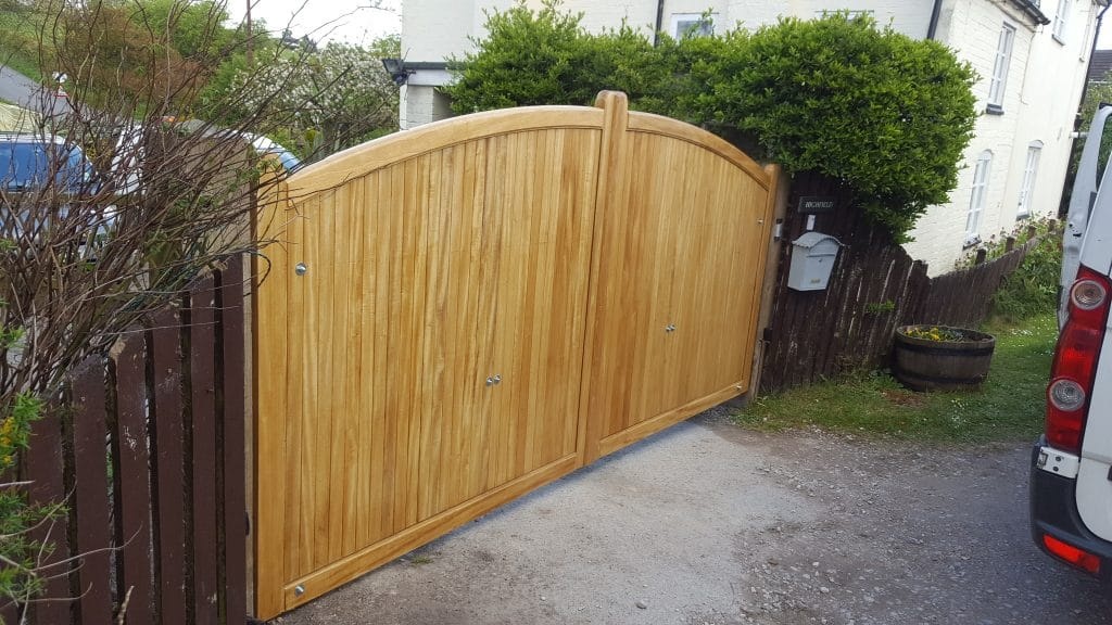 Idigbo arch top hardwood driveway gates