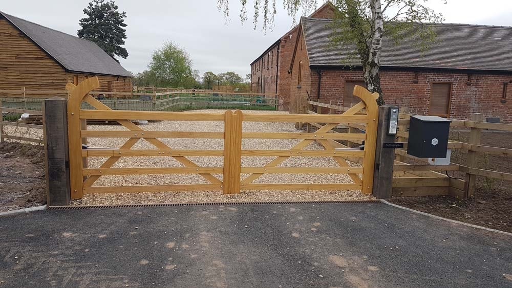 Idigbo 5 bar wooden field gates for a residential driveway