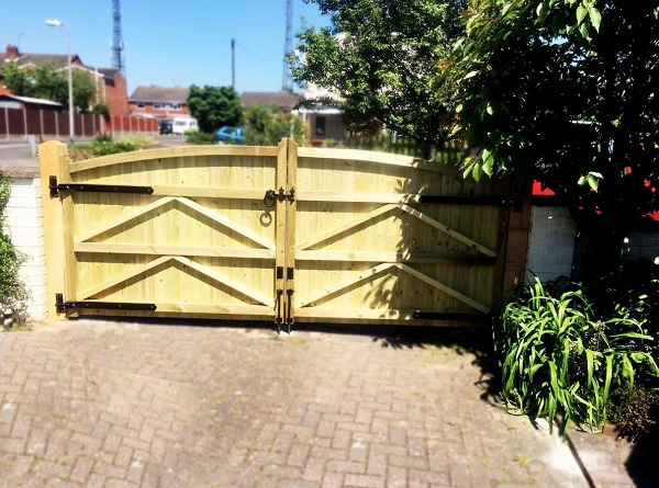 Hook and band hinges fitted to back of wooden driveway gates