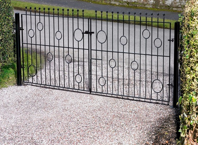 Picasso modern driveway gates fitted to residential parking area