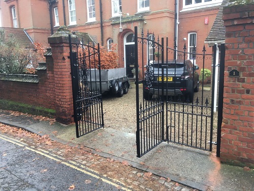 Royal Premier made to measure double bi folding gates fitted to brick pillars