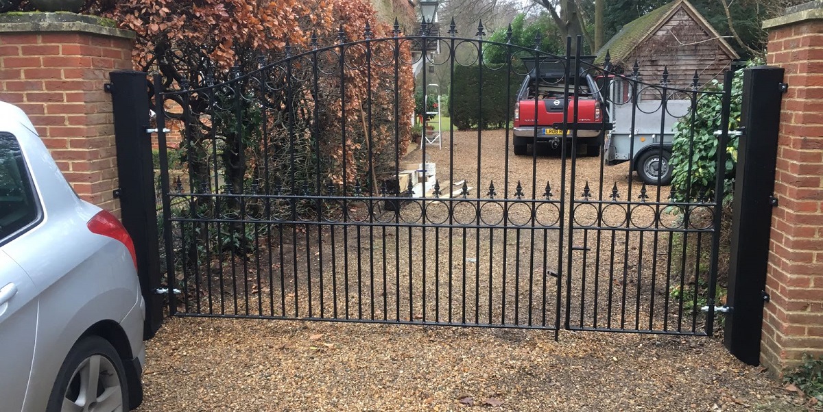 Bespoke Royal Talisman wrought iron gates installed to driveway 