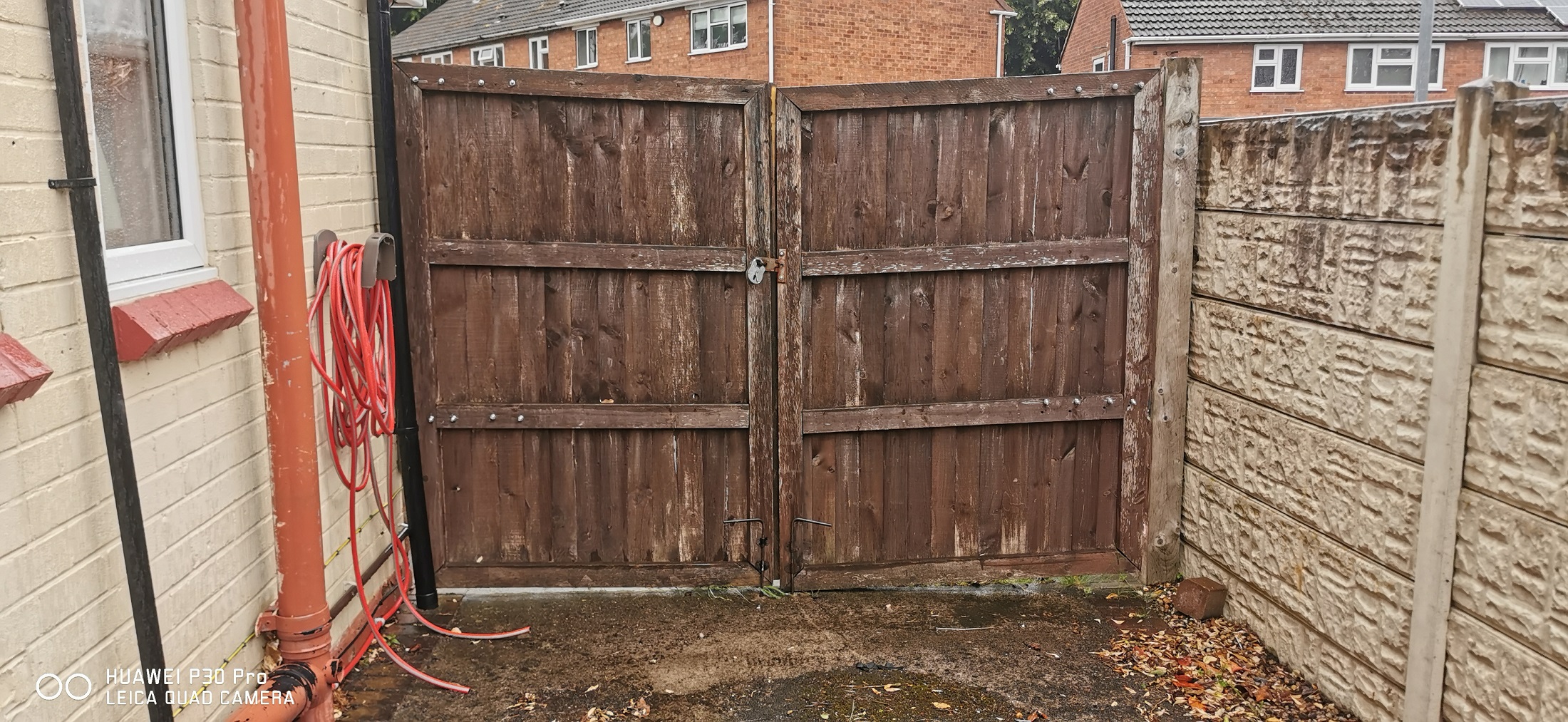 Old wooden gates sagging in the middle