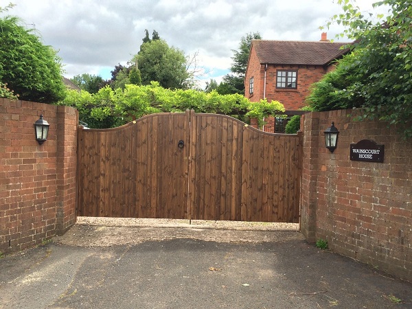 Essex double wooden driveway gates stained dark brown