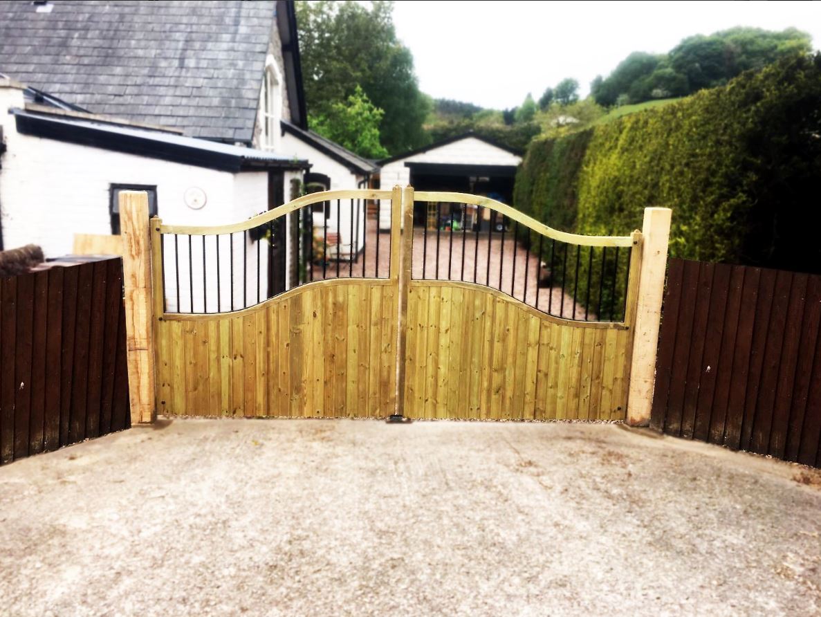 Shrewsbury estate gates with a light oak stain